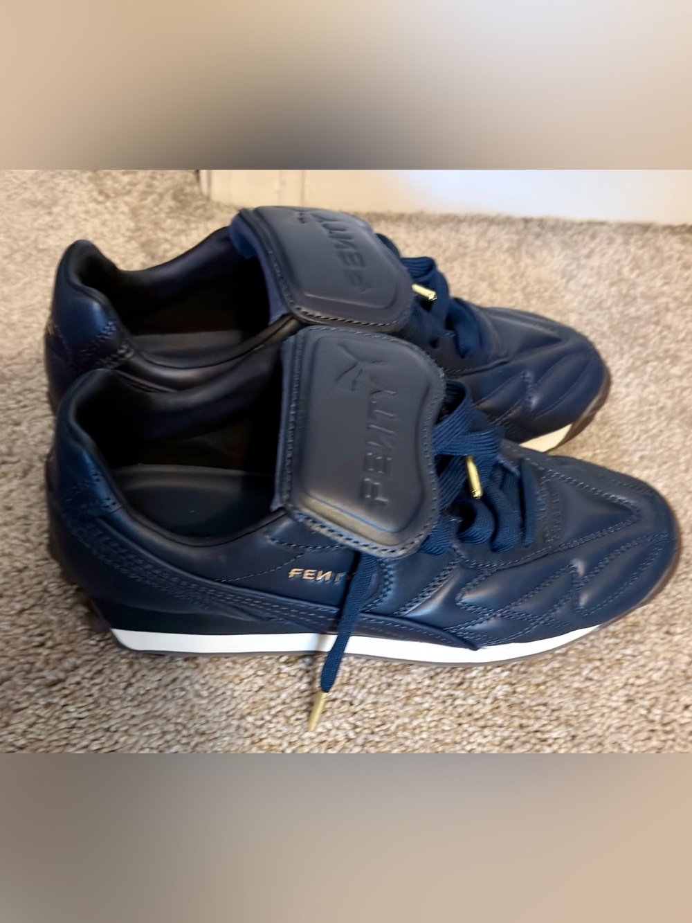 Fenty Beauty Navy Leather Sneakers with Gold Accents